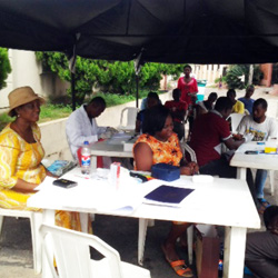 Checking the blood pressure in Ikeja, Lagos, Nigeria - Fadeke Olusanya Abuworonye