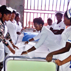 Teaching bed making at the Biaka University Institute of Buea, Cameroon - Mbivnjo Etheldreda Leinyuy