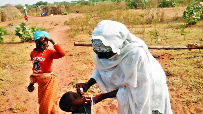 Vaccination of a child during Immunisation Plus Days (IPD) at a Fulani settlement, Gombe, Nigeria - Saude Abdullahi Ibrahim