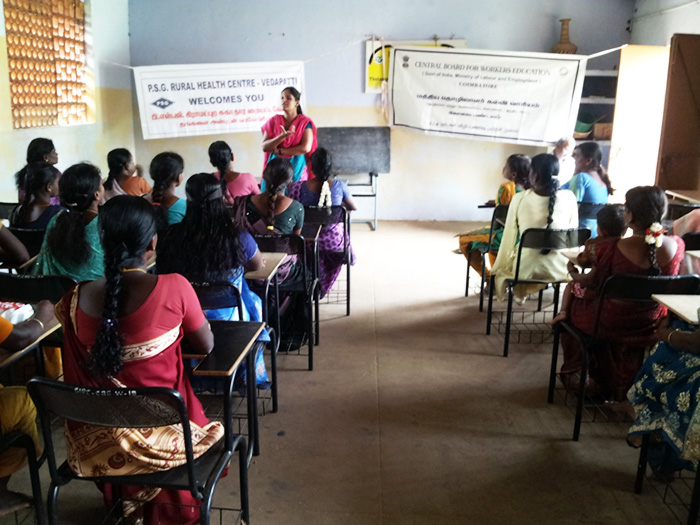 Dr. G. Subhashini addresses the tribal women in a health education session in Anaikatti village, India - Subhashini Ganesan