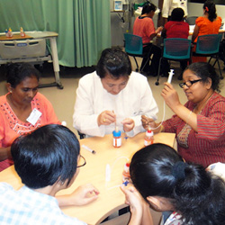 Practicing the umbilical cord catheterization procedure in a Singapore General Hospital simulation room - Yeshey Zangmo